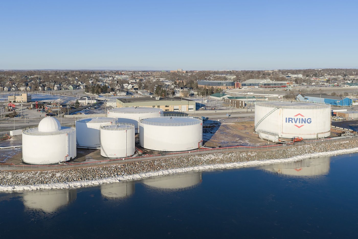 Rows of floating-roof crude oil storage tanks
