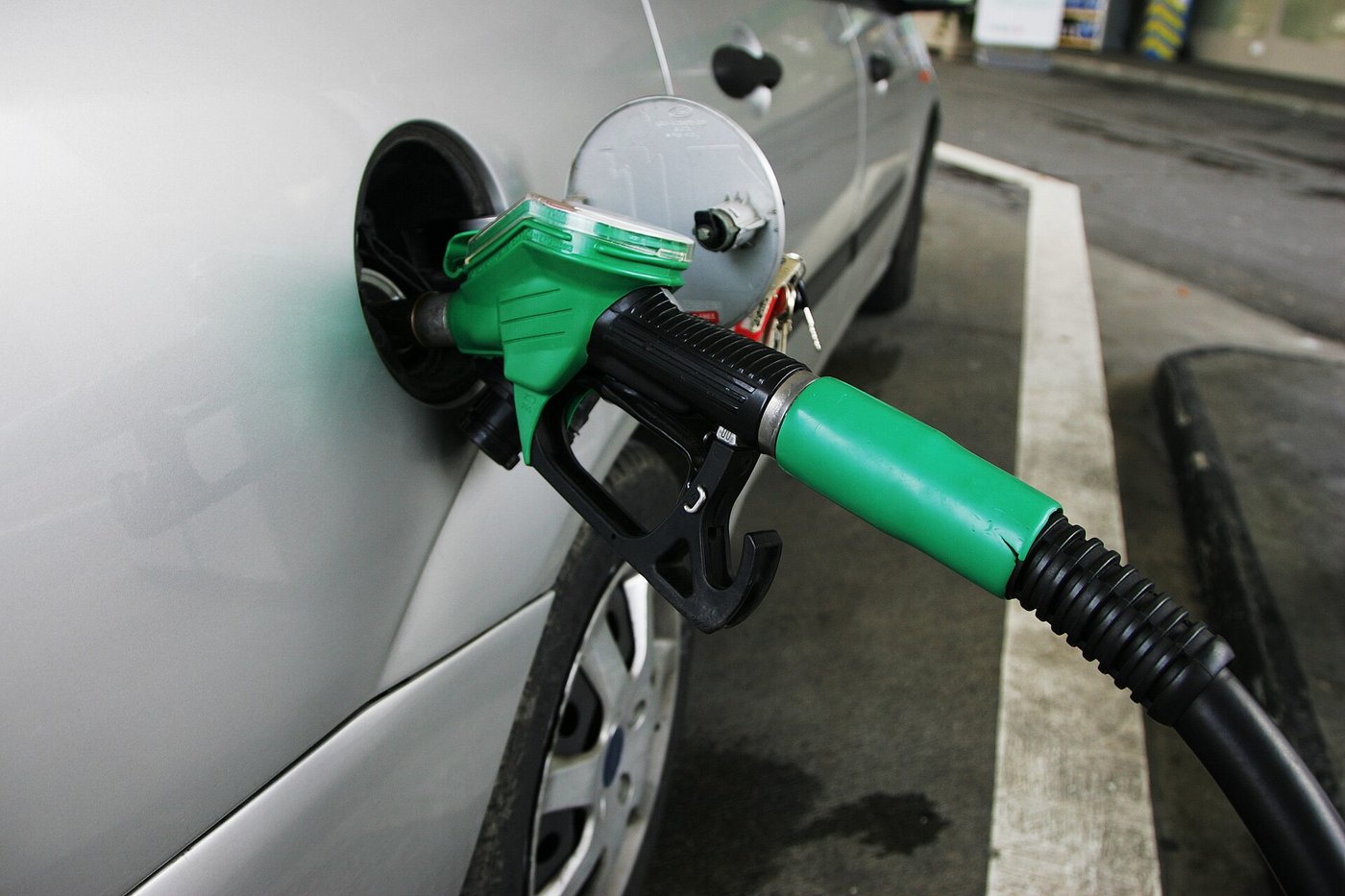 A fuel pump nozzle at a filling station