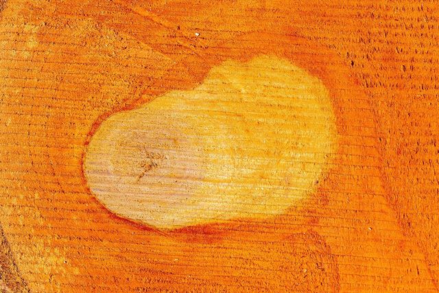 The sawn face of a hardwood board, showing grain and figure
