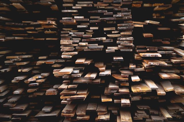 Sawn softwood planks stacked in a timber yard